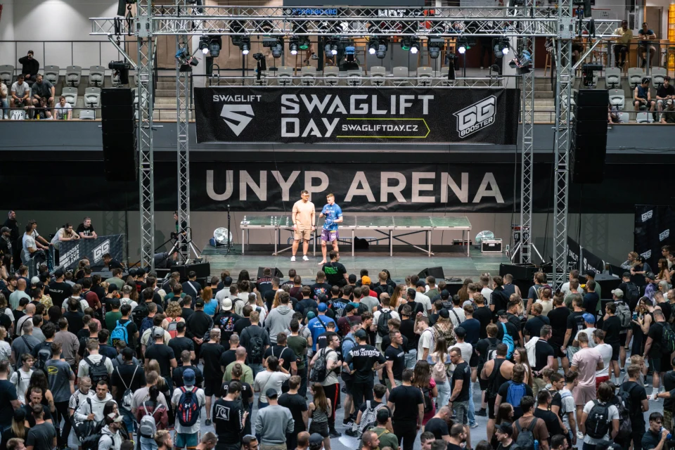 SWAGLIFT DAY hosts on stage in the middle of an arena full of fans